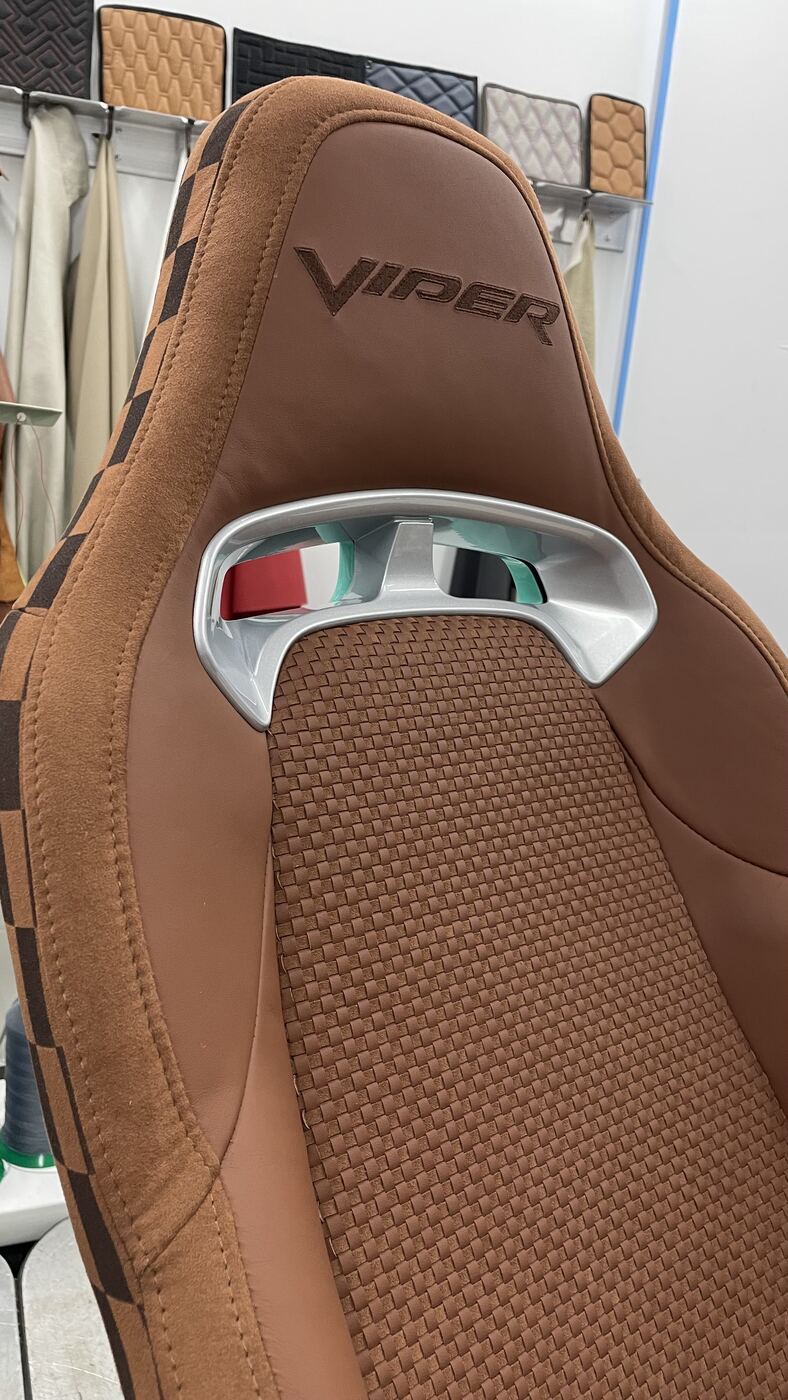Headrest with embossed Viper logo on custom tan leather